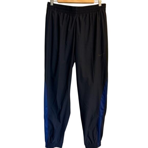 Nike Dri-FIT Windbreaker Track Jogger Pants Women’s Large Blue Zip Pockets - Picture 2 of 7